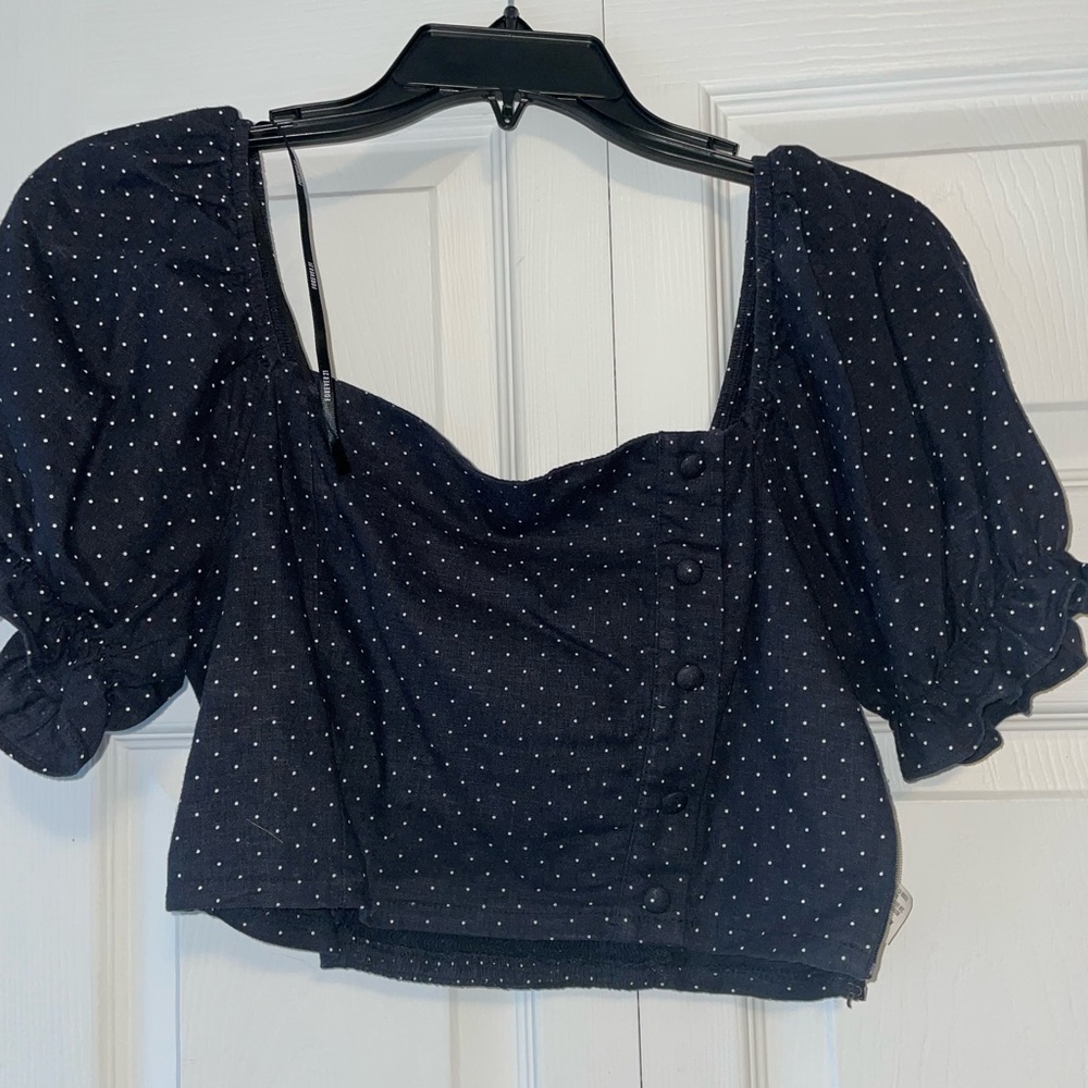 Black polka dotted going out top